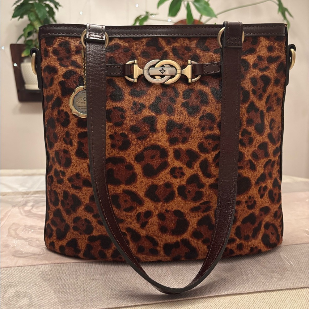 Patricia Nash leopard Lundy shoulder bag with Crossbody strap.